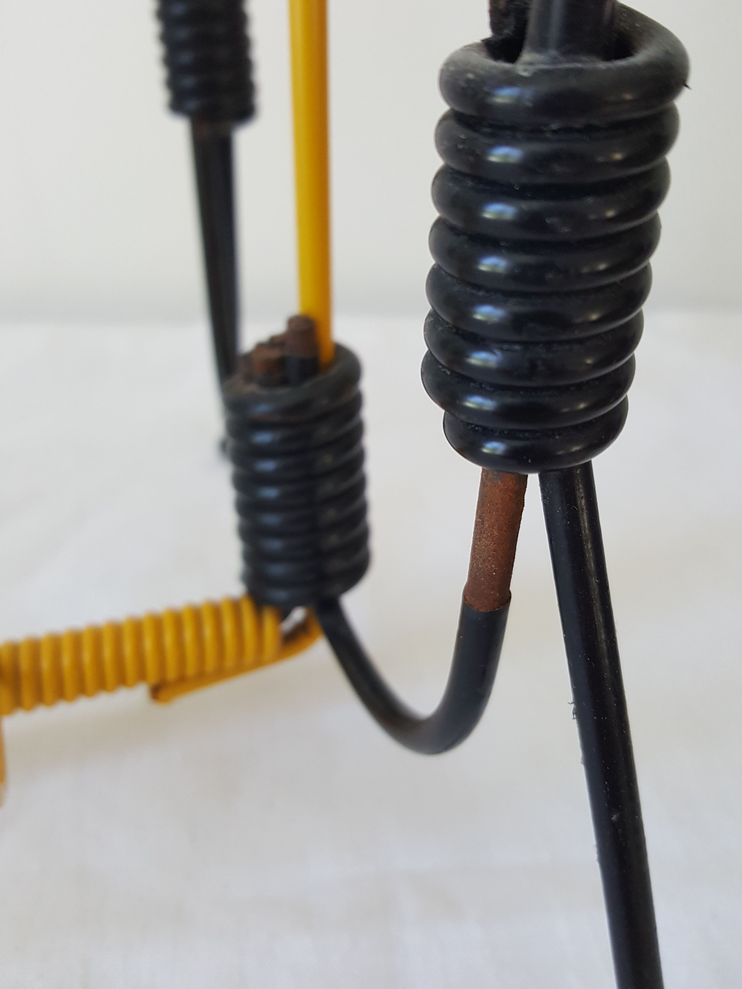 Black and yellow metal magazine holder 70s