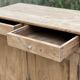 Small Parisian buffet with 2 doors and 2 drawers in light wood.