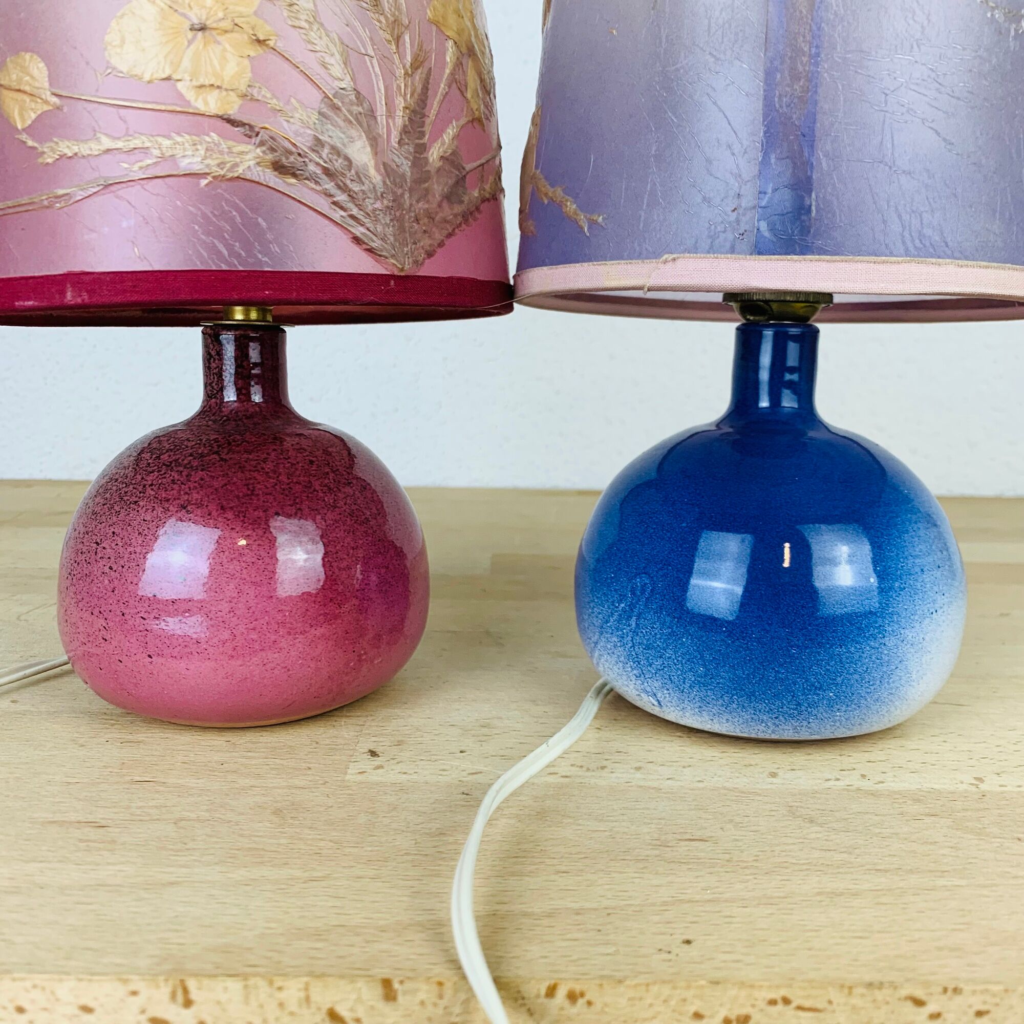 Pair of pink and blue ceramic fig lamps, dried flowers lampshade