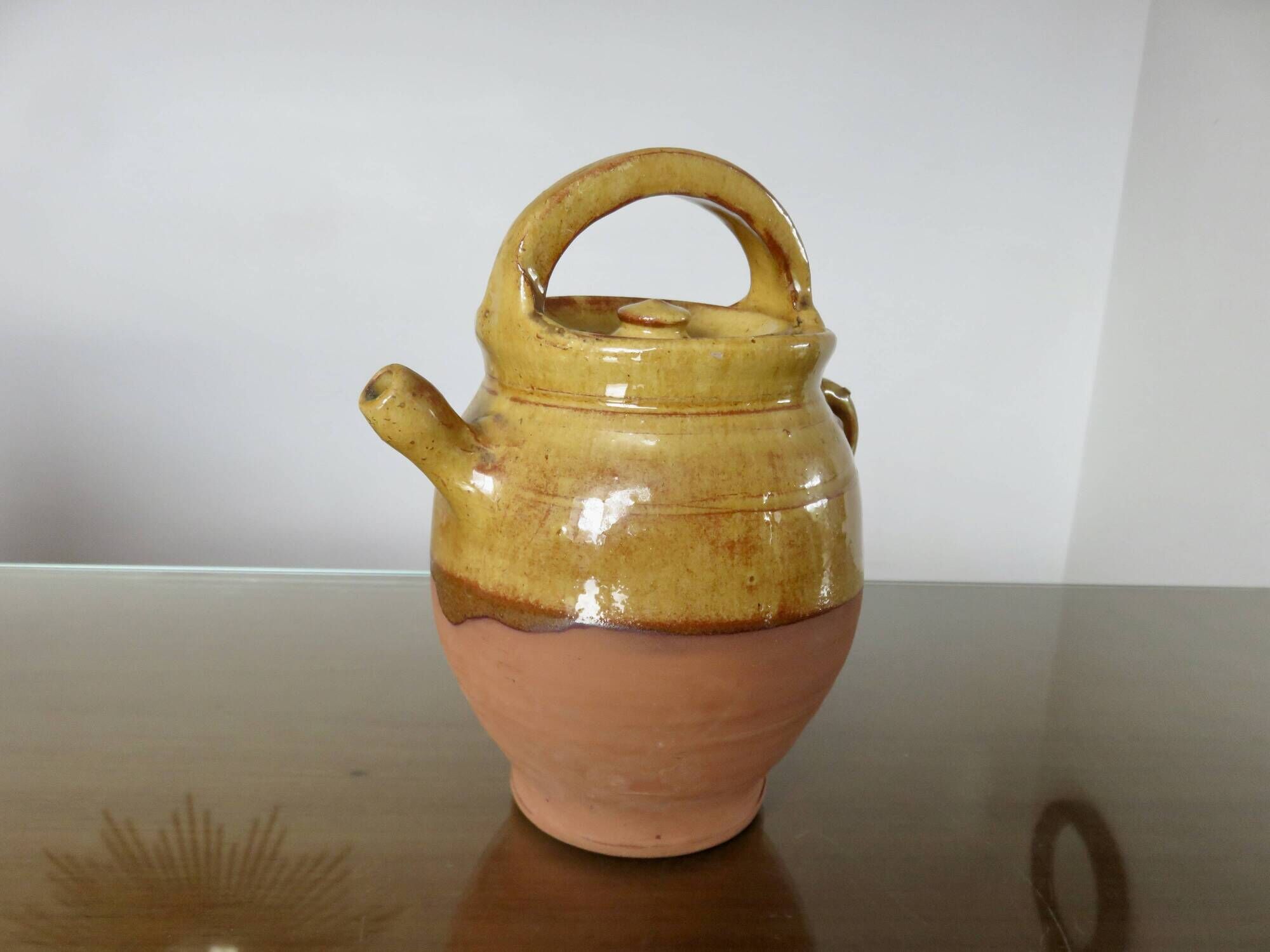 Glazed yellow terracotta jug, south-west of France.