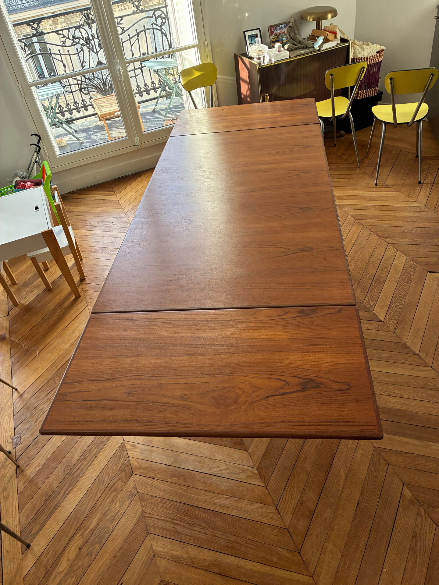 Extendable dining table in teak by Ib Kofod-Larsen