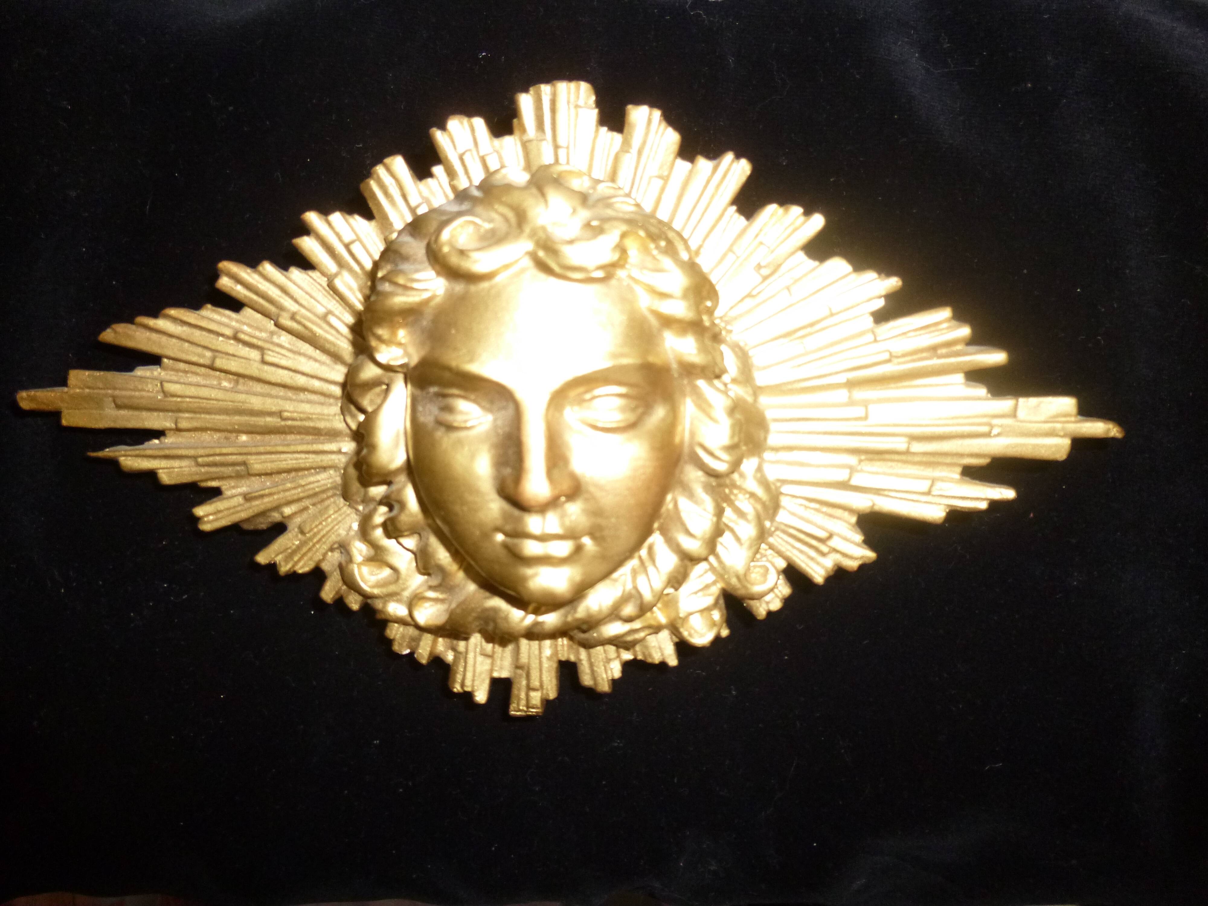 Sun, wall-mounted gilded wood