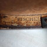 Antique curved wooden children's chair by Fischel, early 20th century.