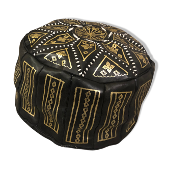 Black leather pouf