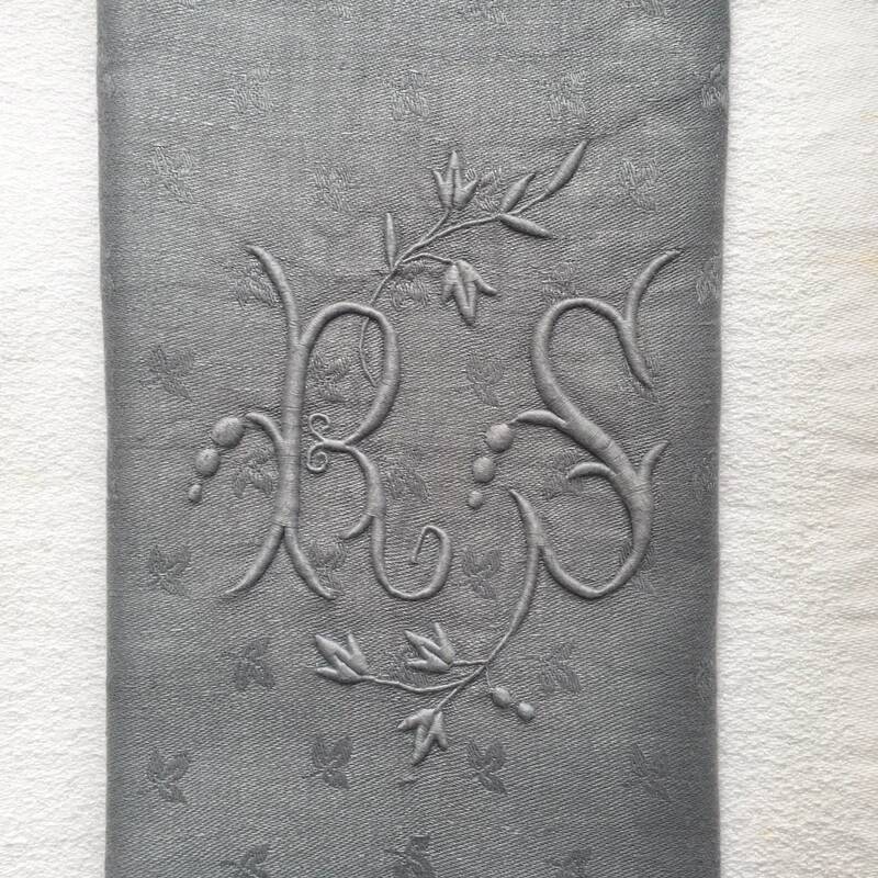 Old embroidered table napkin R S Grey