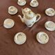 Antique coffee service in longwy porcelain – floral decoration and gilding –