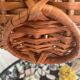 Brown woven vintage wicker basket with 2 lids.