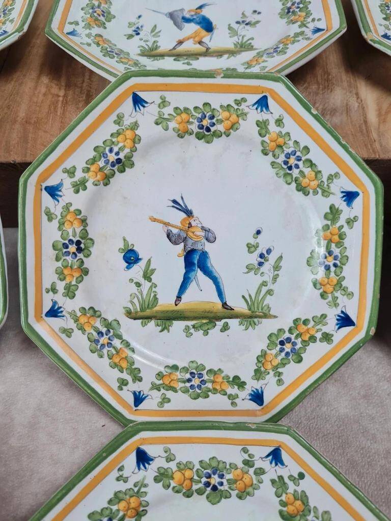 Set of 12 small antique plates by Alfred Renoleau, different designs.