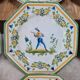 Set of 12 small antique plates by Alfred Renoleau, different designs.