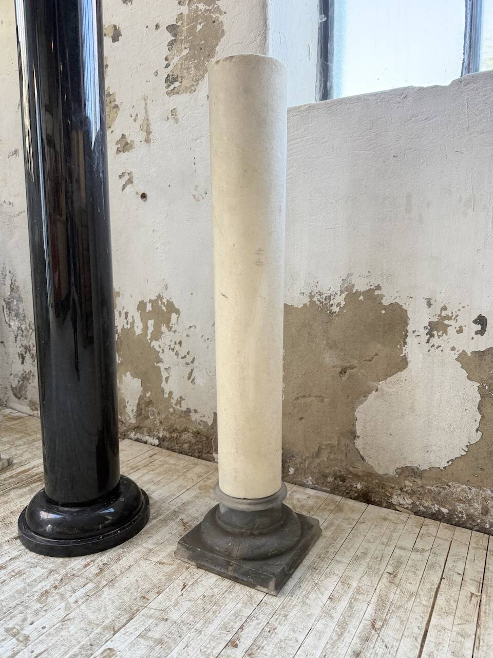 Set of 4 marble columns or pedestals.