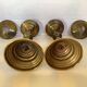 Pair of tulip foot candlesticks in brass