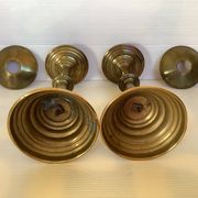 Pair of tulip foot candlesticks in brass