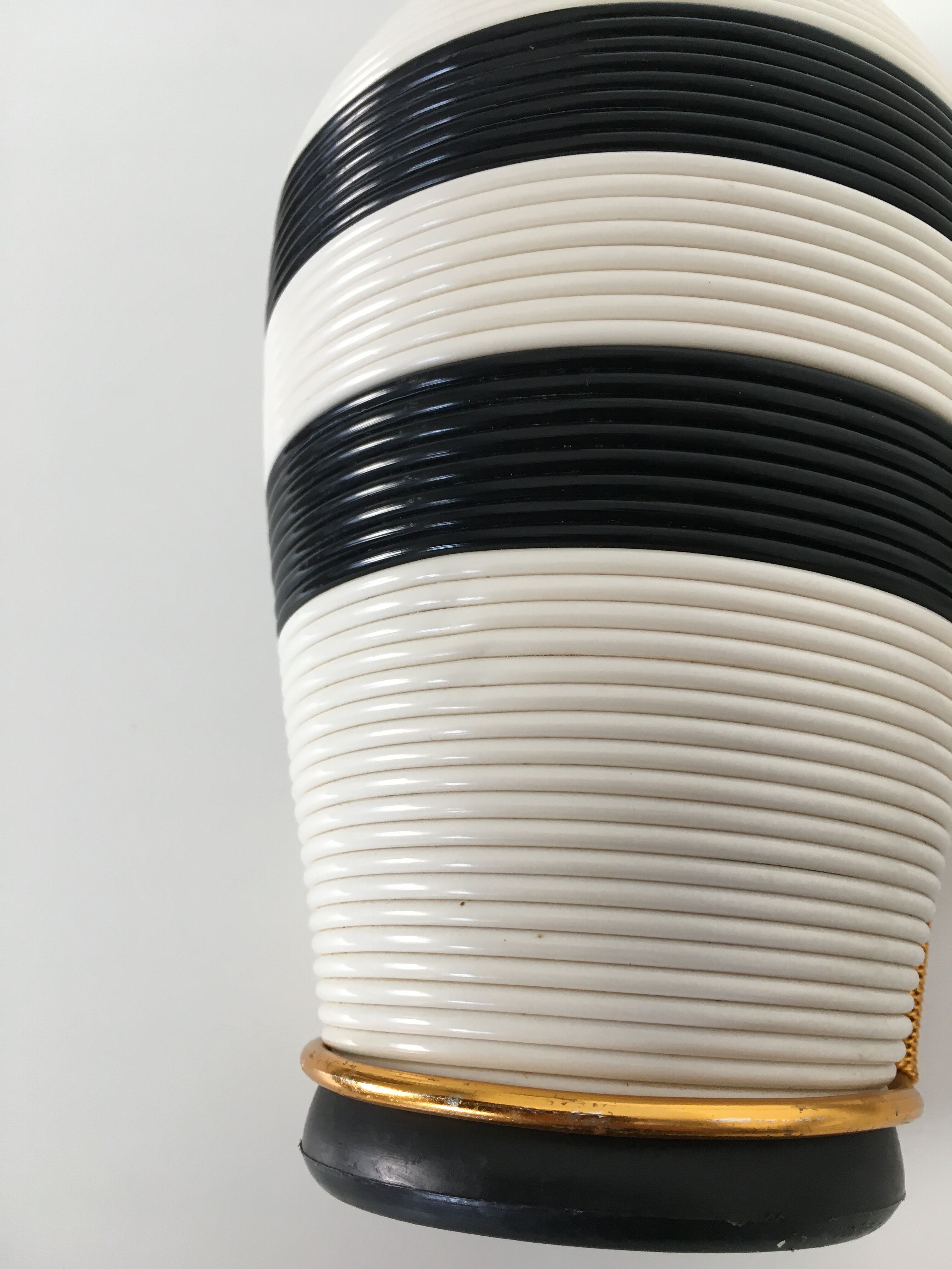 White and black scoubidou bottle