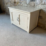 Antique white patinated low cabinet