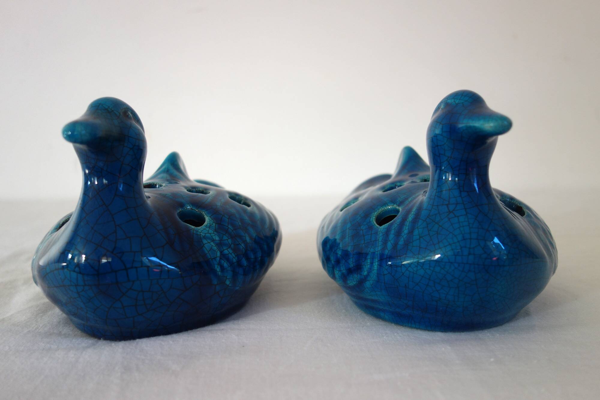 2 blue ceramic duck flower picks