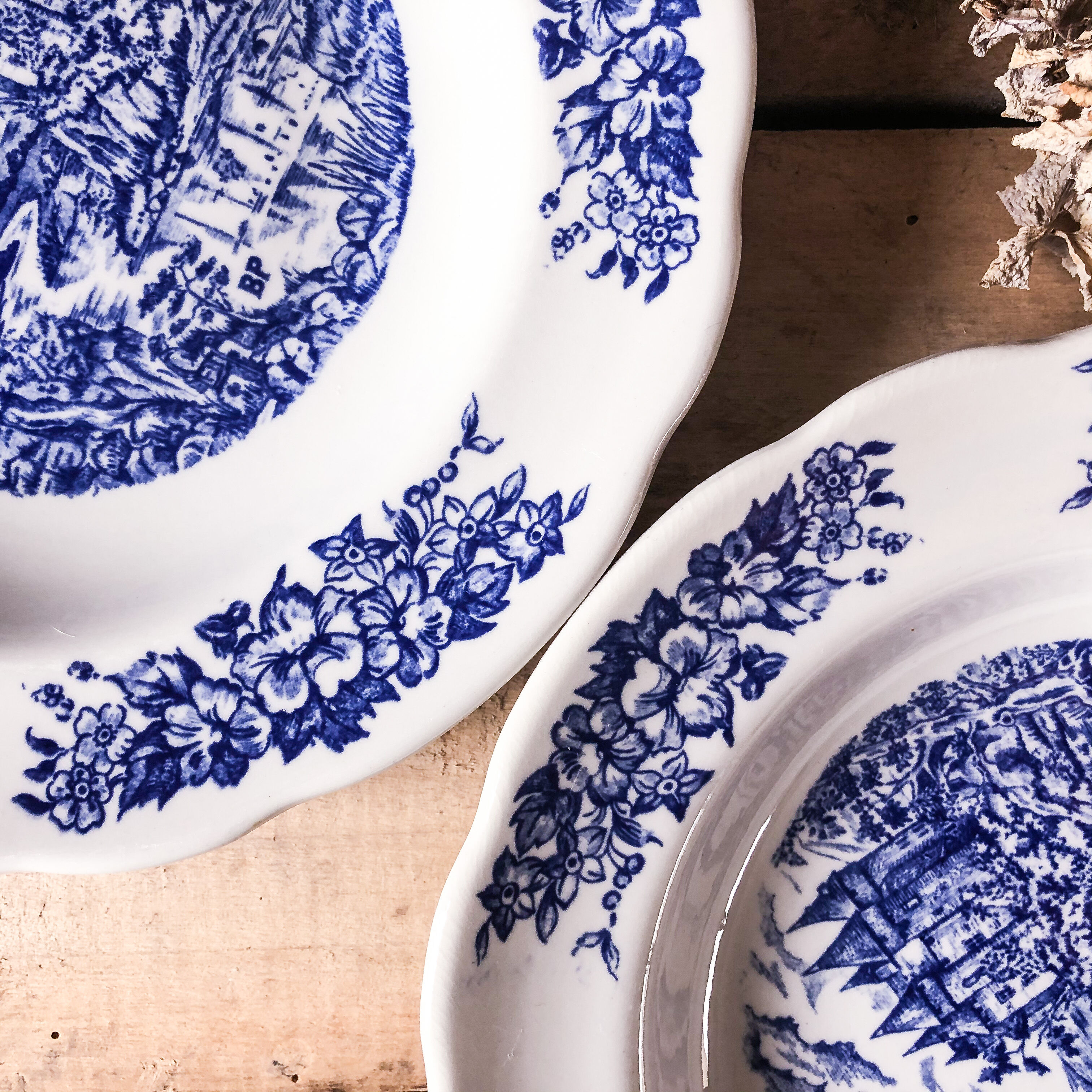 Trio of hollow porcelain plates