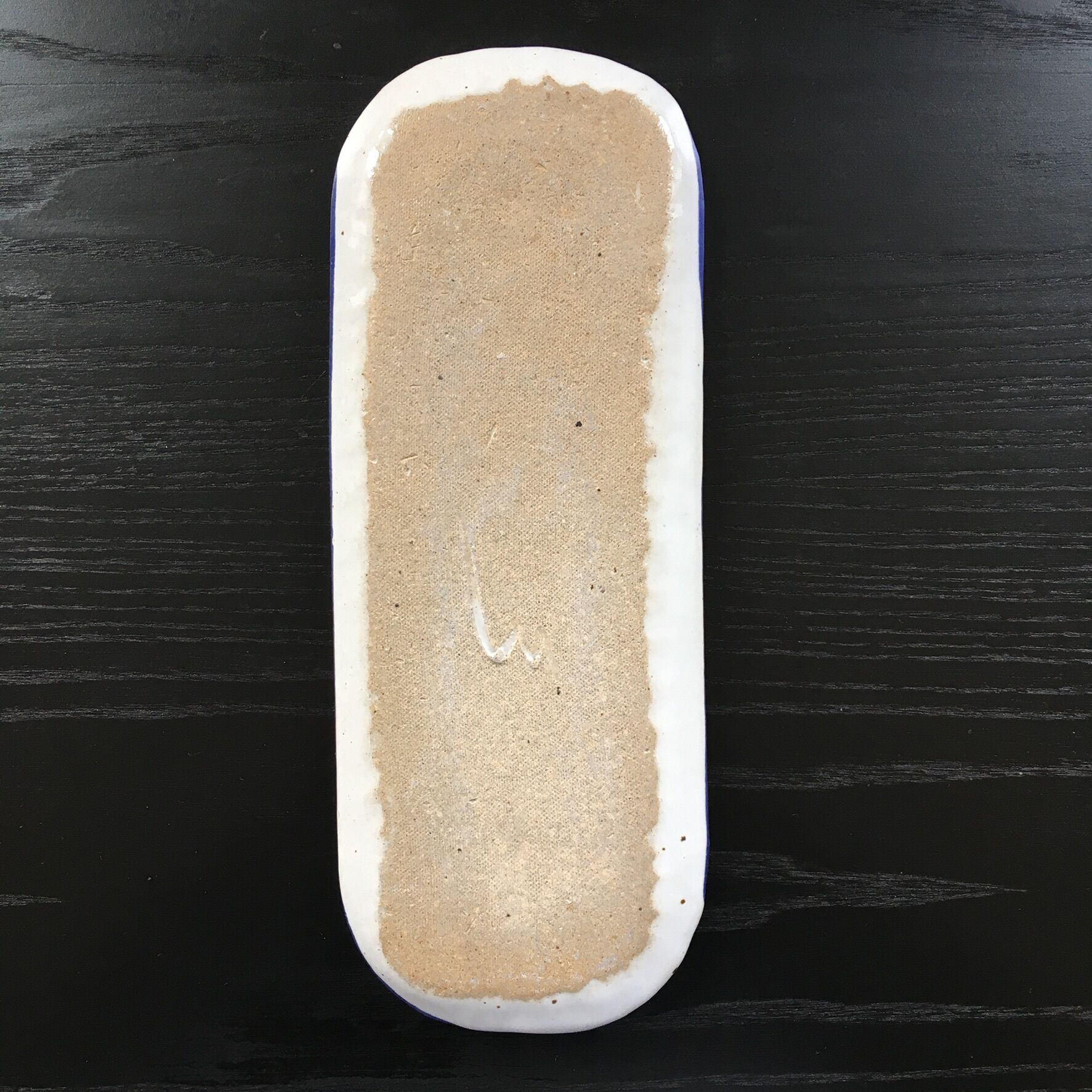 Hortensia-decorated stoneware plate signed