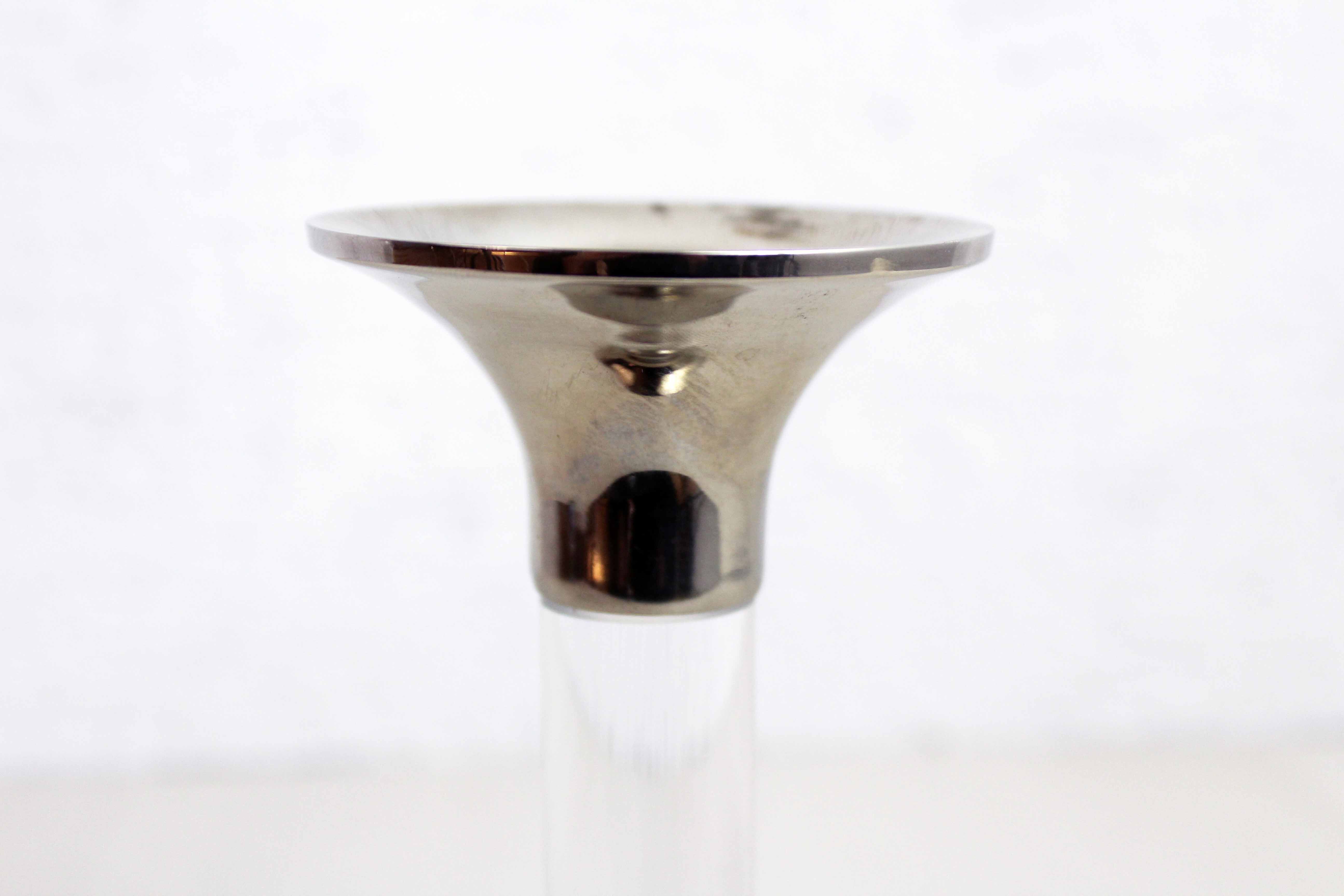 Candle holder in silver metal and lucite