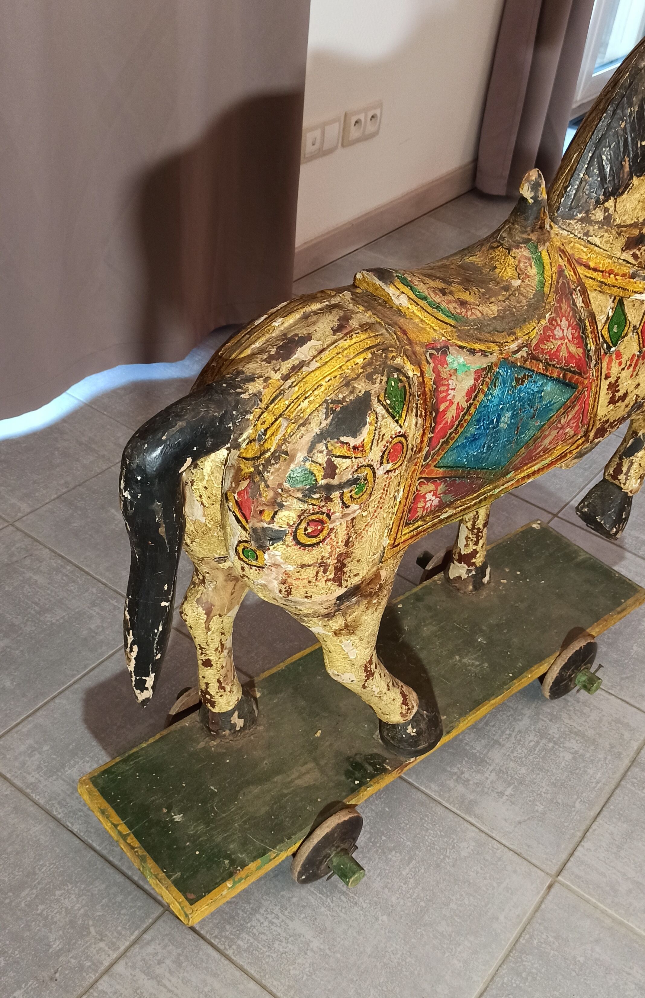 Old horse with wheels