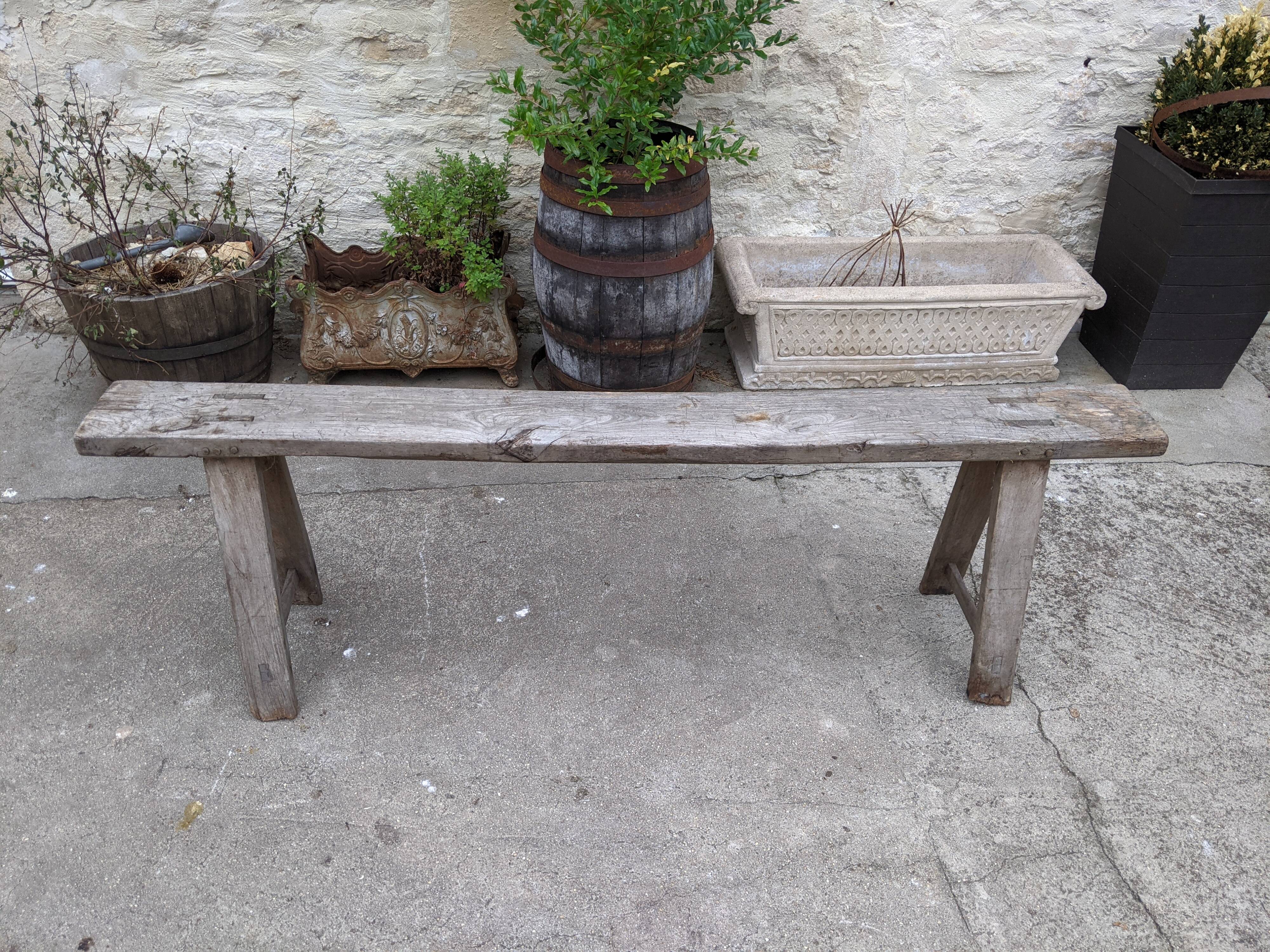 Old farm bench in chene