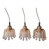 Set of 3 Doria pendant lights in brass and amber-coloured glass, 1960s