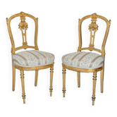 Paire de chaises de style Louis XVI