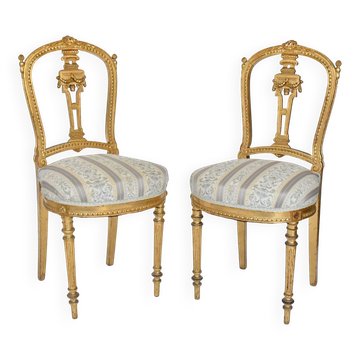 Paire de chaises de style Louis XVI