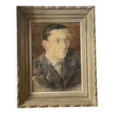 Portrait of a man in pastel under glass, signed, early 20th century.