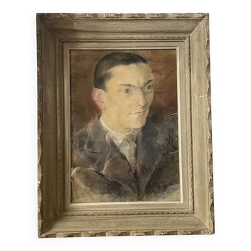 Portrait of a man in pastel under glass, signed, early 20th century.