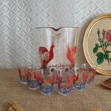 Pitcher and 6 vintage peacock liqueur glasses