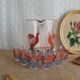Pitcher and 6 vintage peacock liqueur glasses