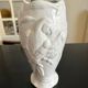 Vase with parrots