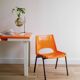 Vintage orange children's chair from the seventies.