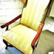Wingback armchair in walnut in the French Regency style with stretcher in