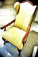 Wingback armchair in walnut in the French Regency style with stretcher in