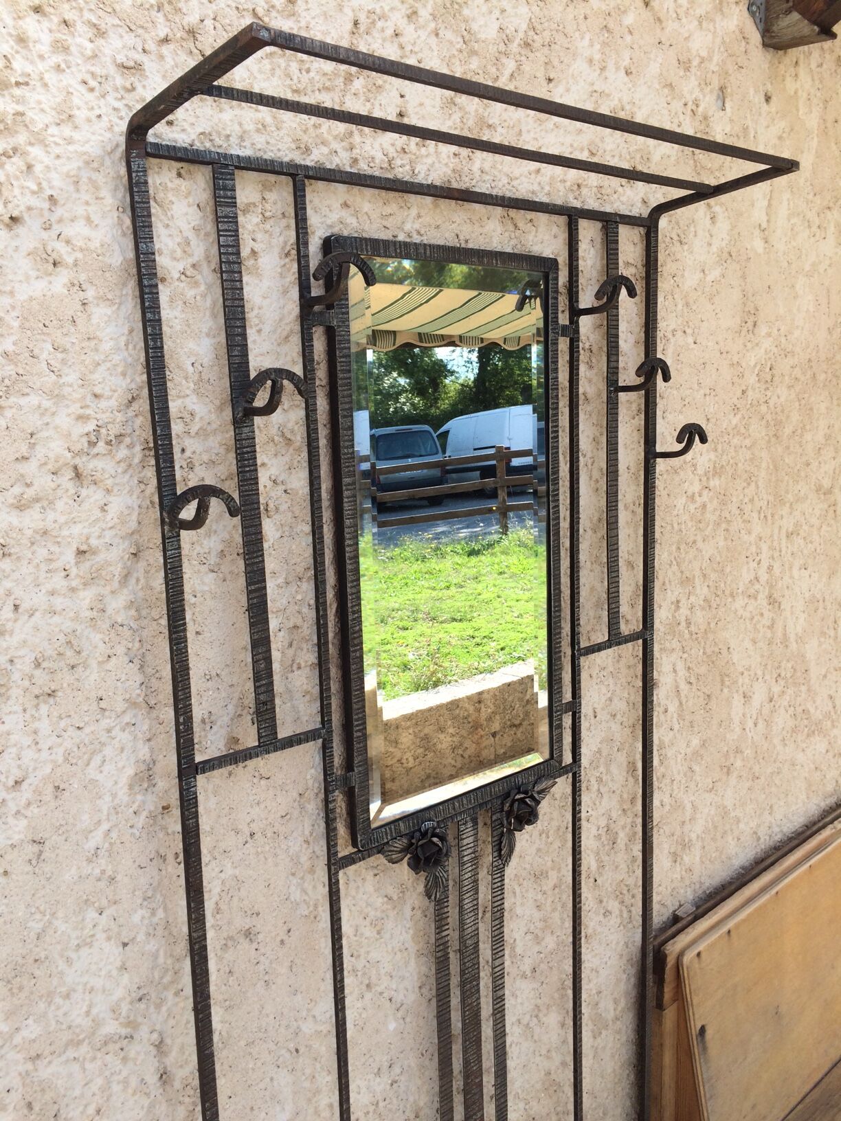 Old Art Deco coat rack in hammered iron