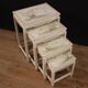 Set of 4 French lacquered and painted coffee tables
