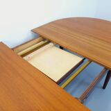 Large vintage Scandinavian round table from the 50s 60s in teak with extensions