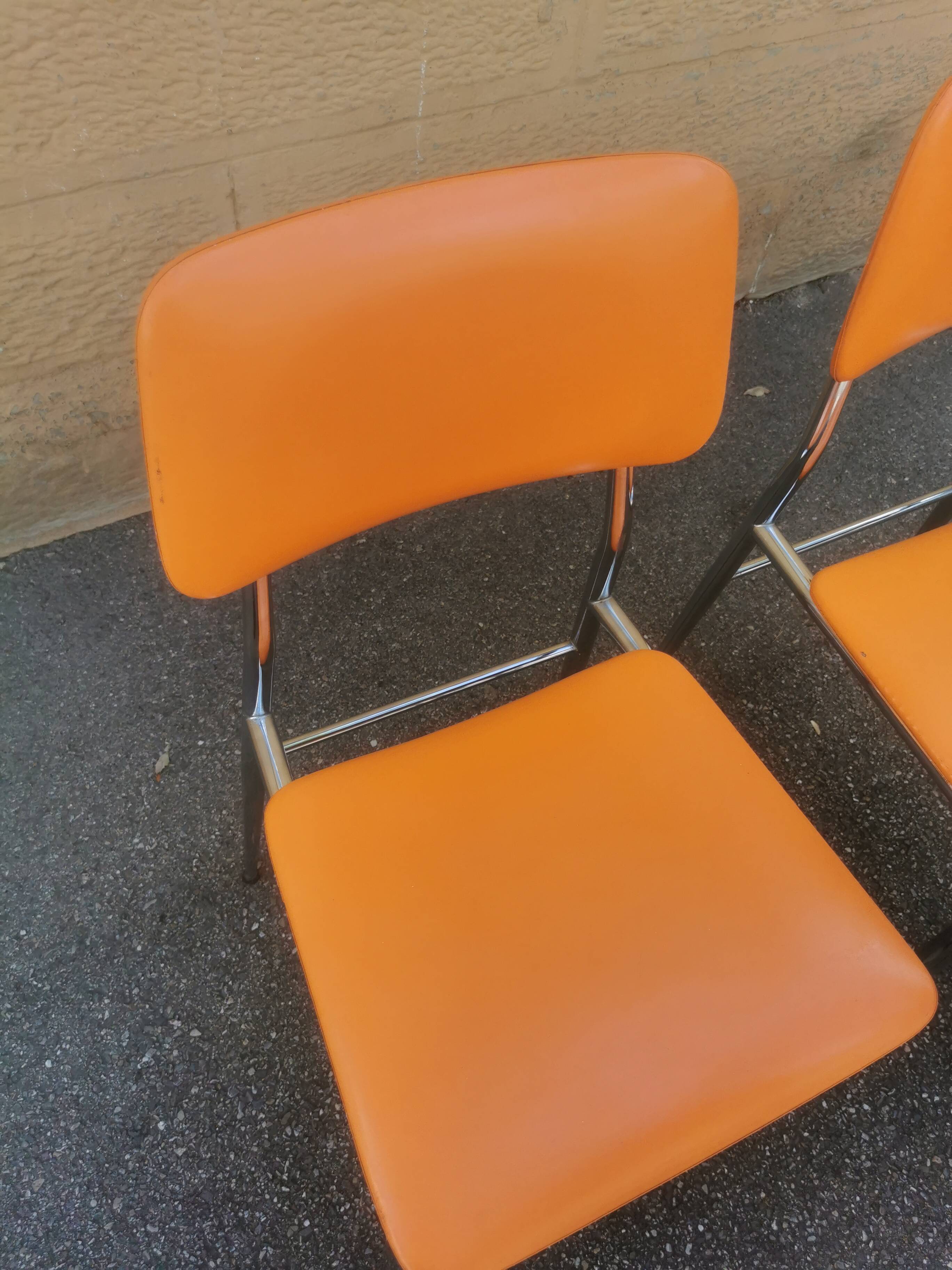 Tubmenager orange vintage chairs