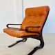 Vintage Scandinavian cognac lounge chair by Oddvin Rykken