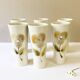 Large ceramic glasses, hand-painted flower pattern, beige/cream tones
