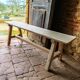 Rustic, raw solid oak bench.