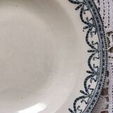 Together six old plates are mismatched in green
