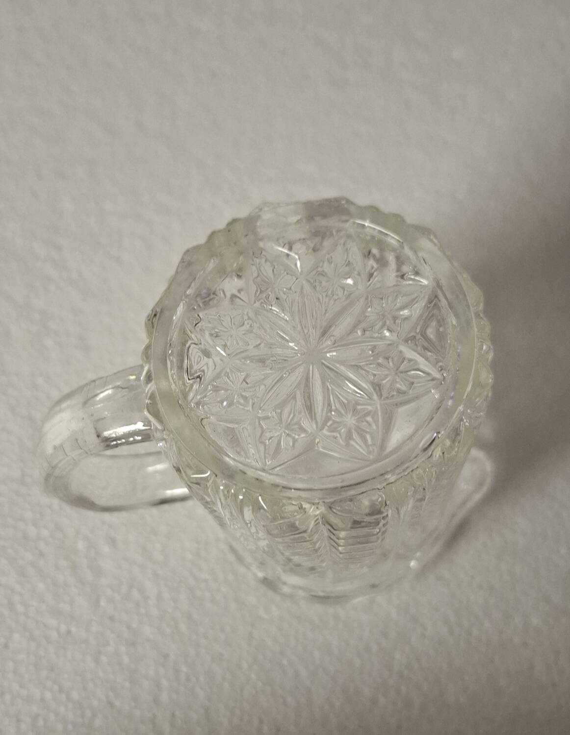 Moulded glass cream pot