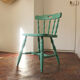 Rustic green ranch style wooden chair