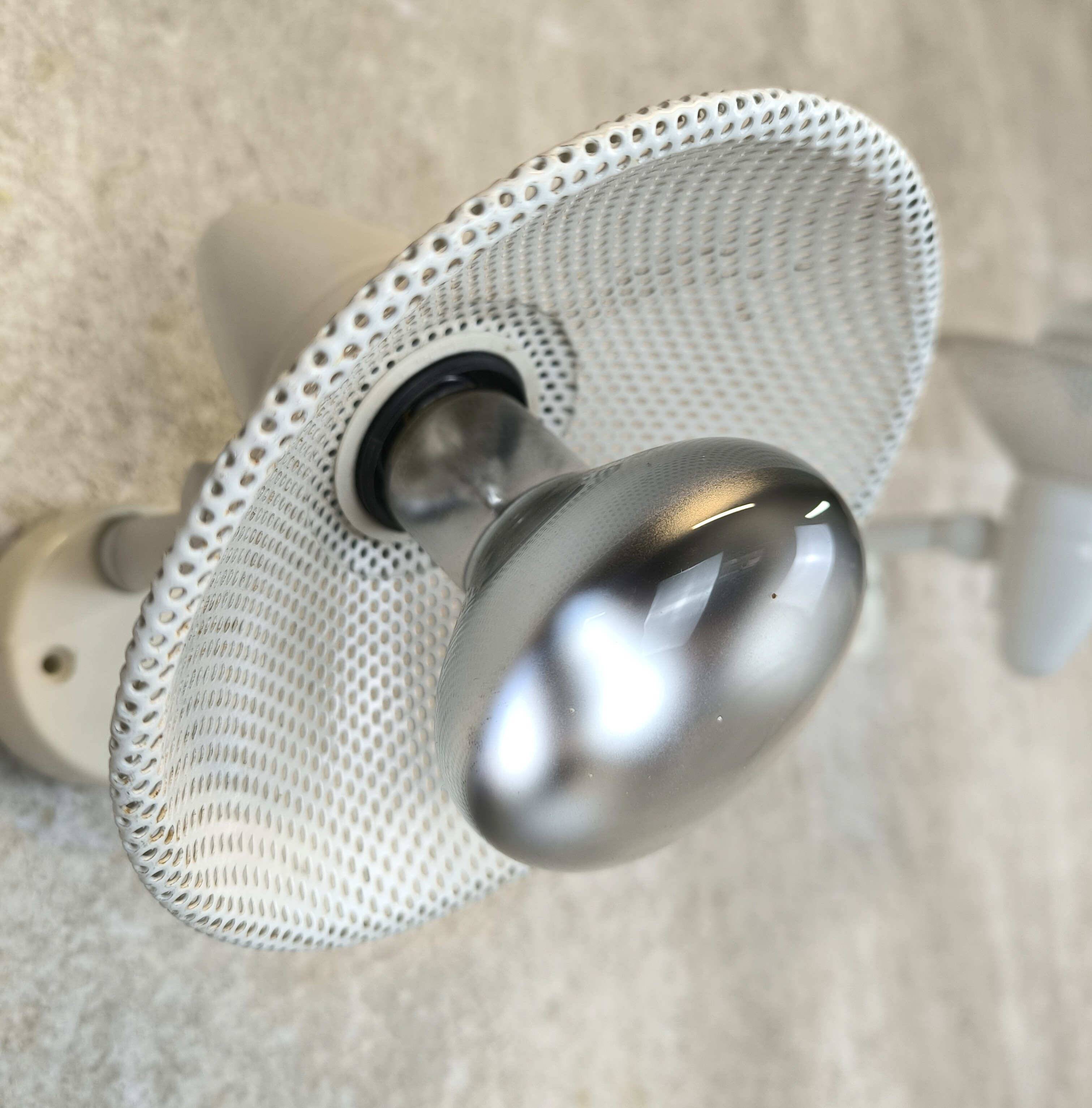 Pair of vintage wall-mounted spotlights