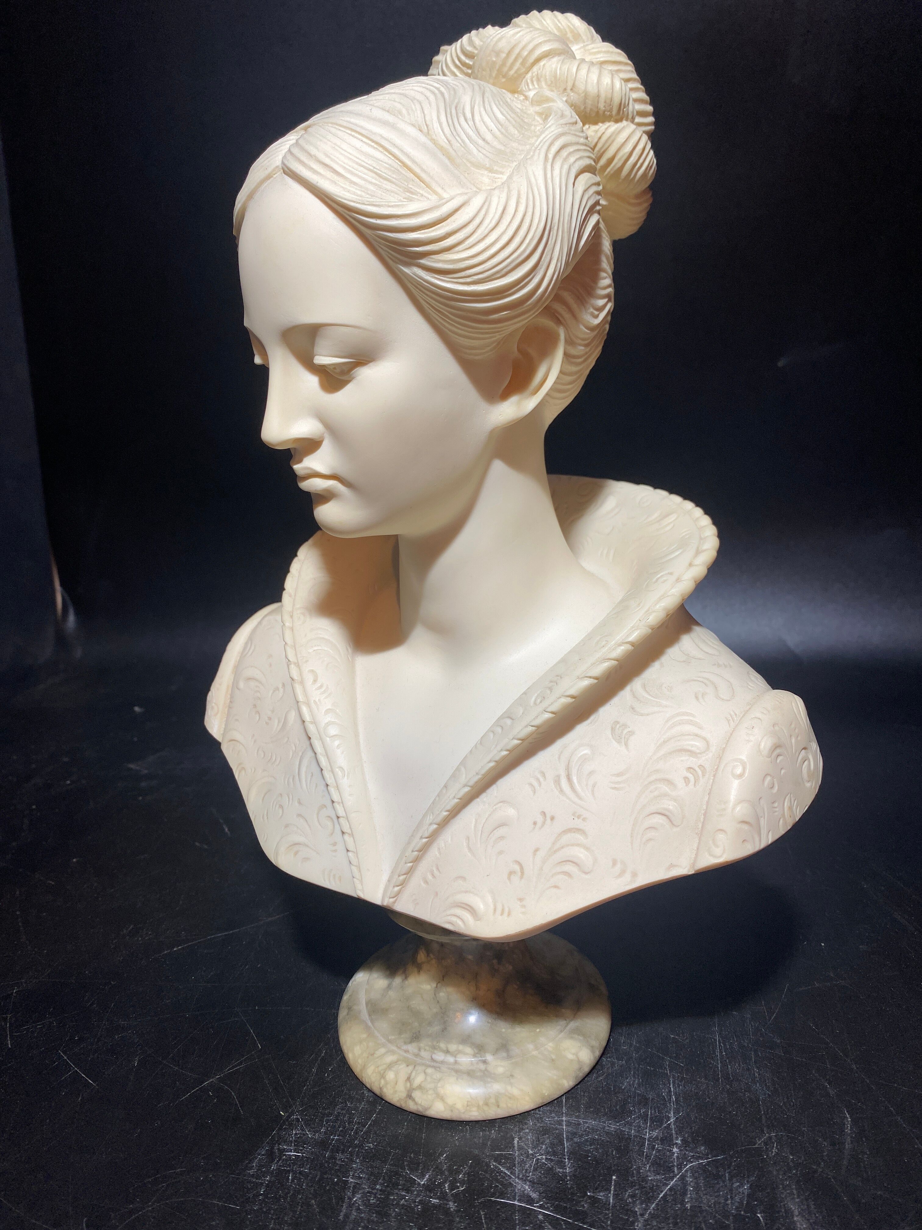 Hand-retouched cast plaster bust