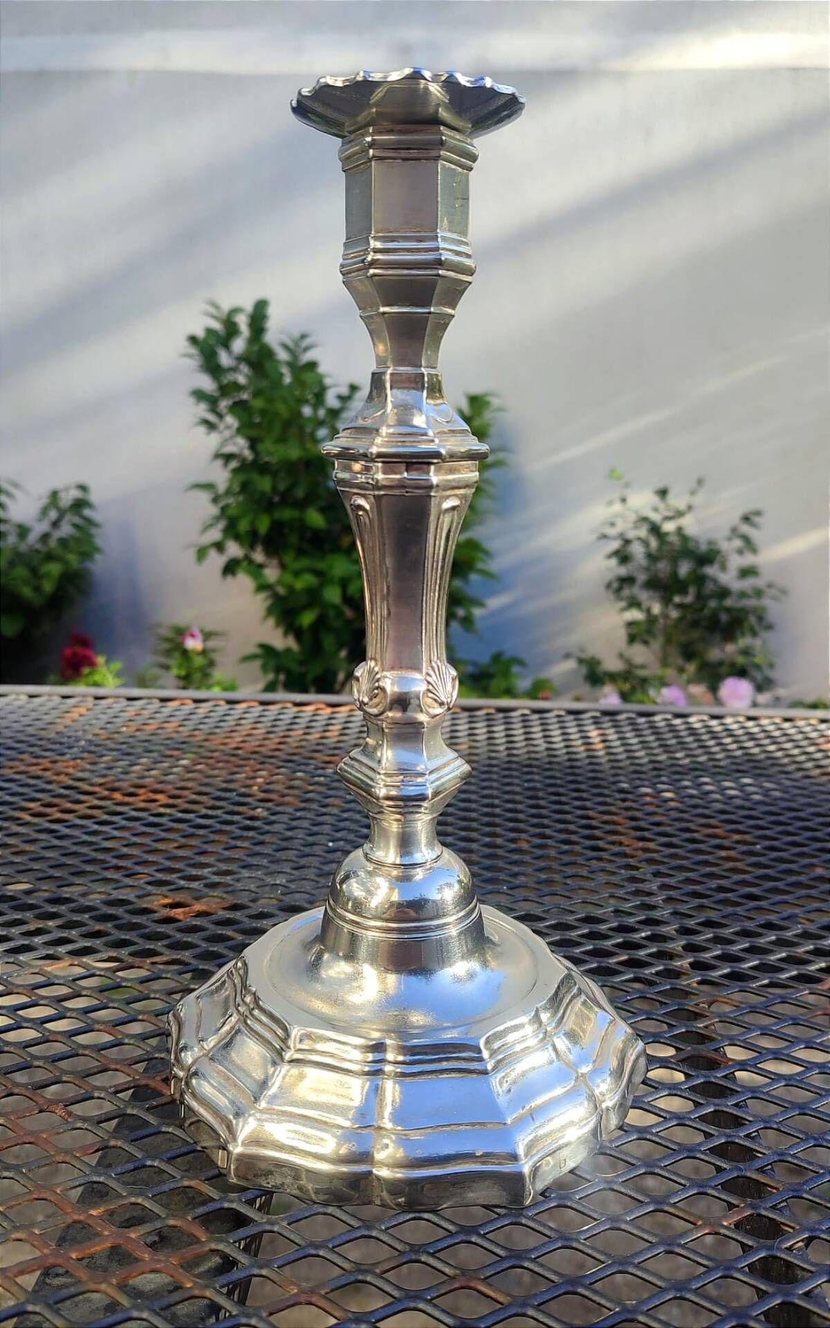 Magnificent pair of silver candlesticks.