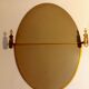 Miroir ovale pivotant en laiton doré 1940/1950 de style néo-classique 40x70cm