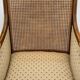 Fauteuil bergère à dossier canné